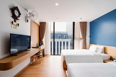 Habitación doble Deluxe con 2 camas — A25 Premium Hotel - 36 Giang Văn Minh